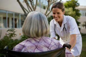 doctor-talking-to-senior-woman-sitting-on-wheelchair.jpg